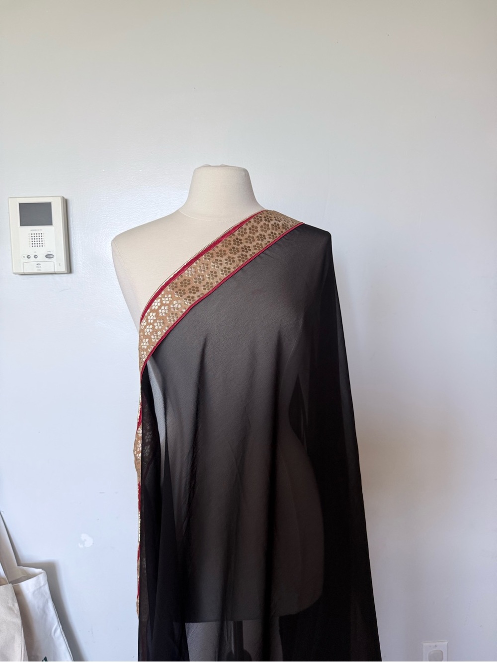 Black Sheer Saree with Gold and Red Floral Border
